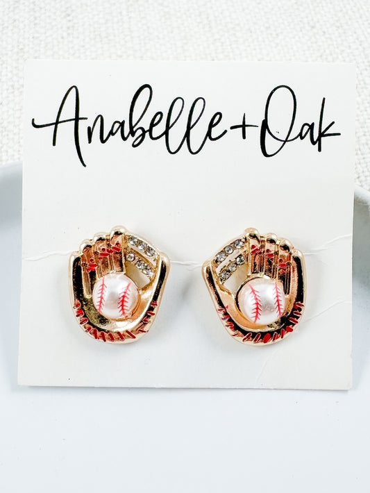 Golden baseball glove stud earrings with rhinestones and pearl baseballs shown on Anabelle+Oak jewelry card