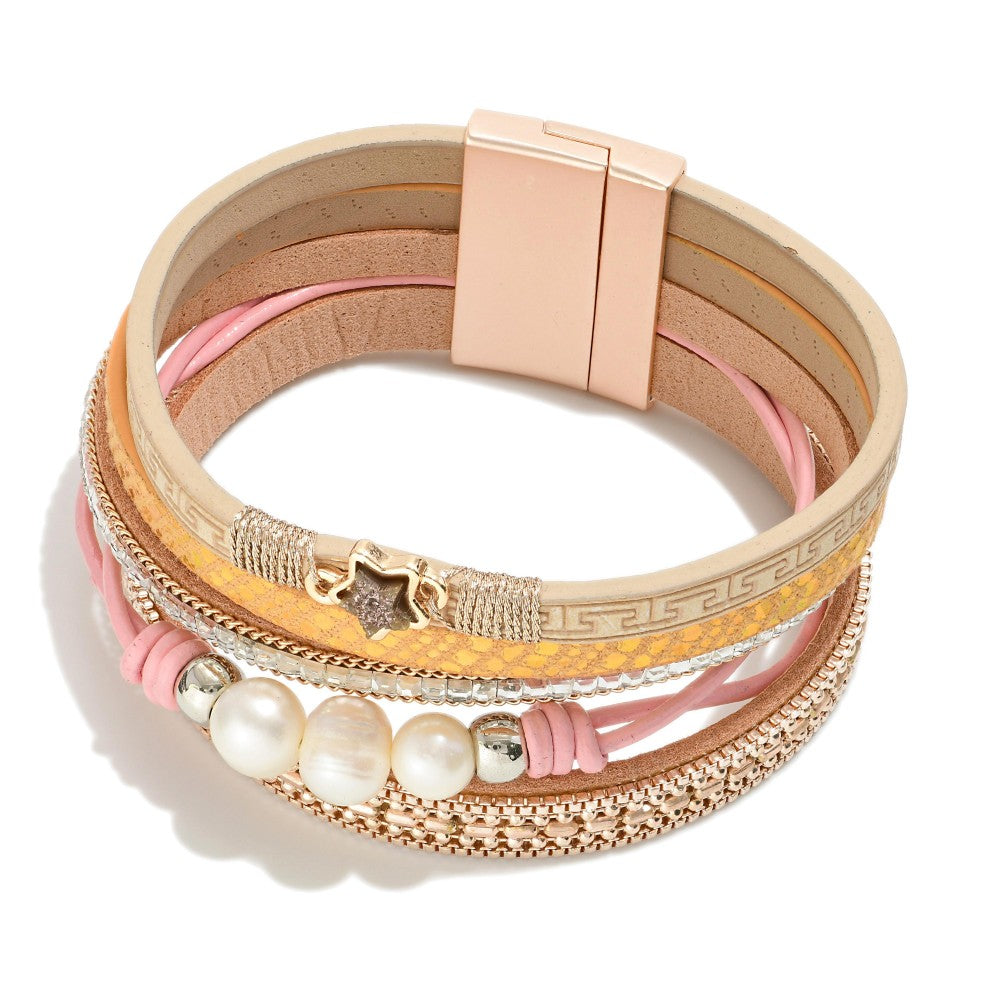 Honey Blush Bracelet displayed on white background — multi-strand magnetic bracelet featuring star charm, pearl accents, and layered blush, gold, and cream bands from Anabelle+Oak.