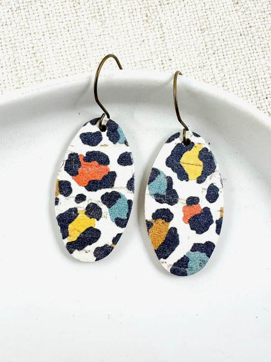 Handmade leather earrings with multicolor leopard print and brass hooks, 1.5-inch drop