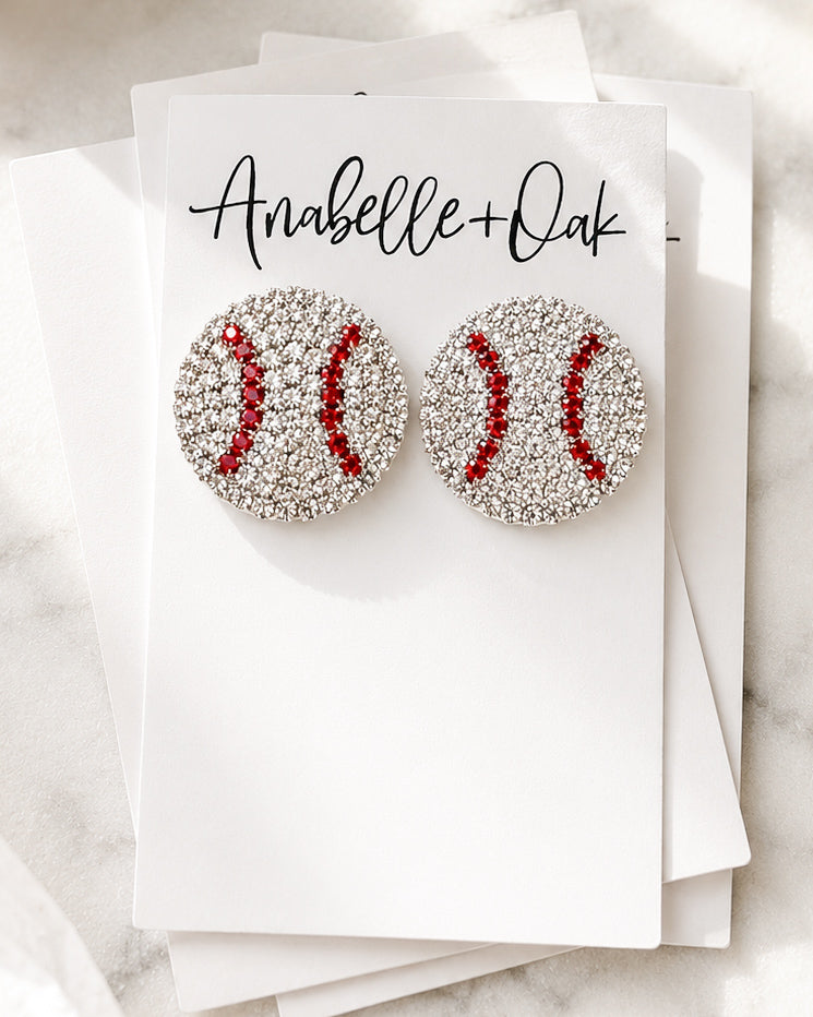 Home Run Luxe rhinestone baseball stud earrings displayed on Anabelle+Oak jewelry card
