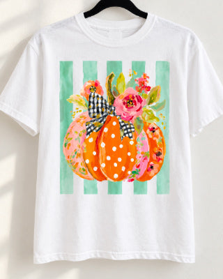 A Little Bit Fancy Pumpkin Tee on white Comfort Colors with floral pumpkin, orange polka dots and aqua stripes