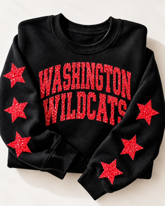 Folded black Washington Wildcats sweatshirt featuring bold red glitter lettering and a soft fleece crewneck design.