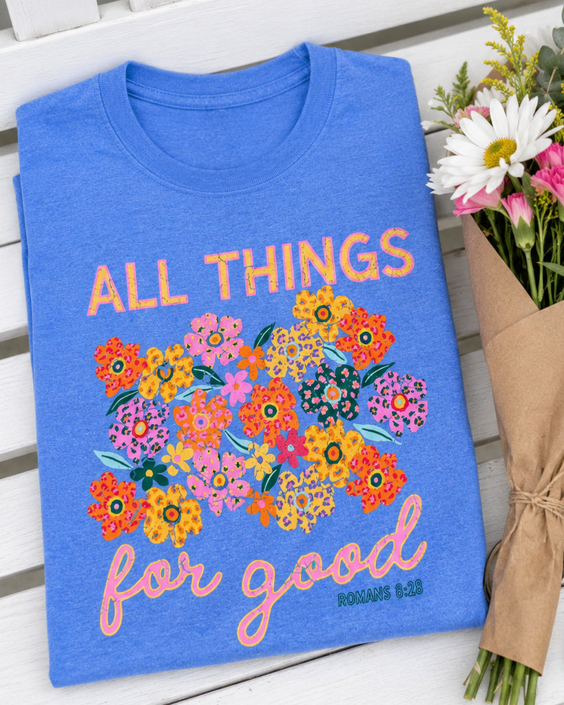 Folded Heather Royal All Things for Good floral Christian tee styled with fresh flowers
