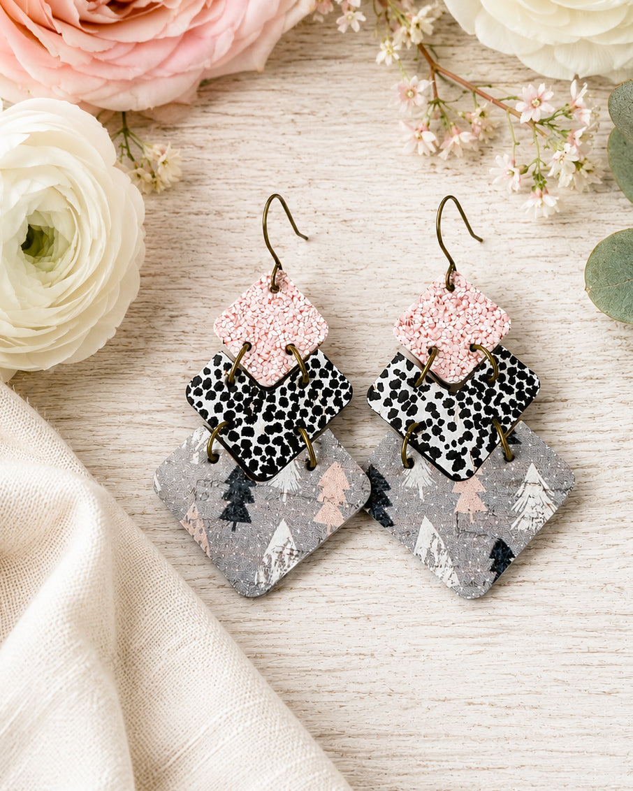 Blush Frost blush pink winter leather earrings with black and ivory tree print