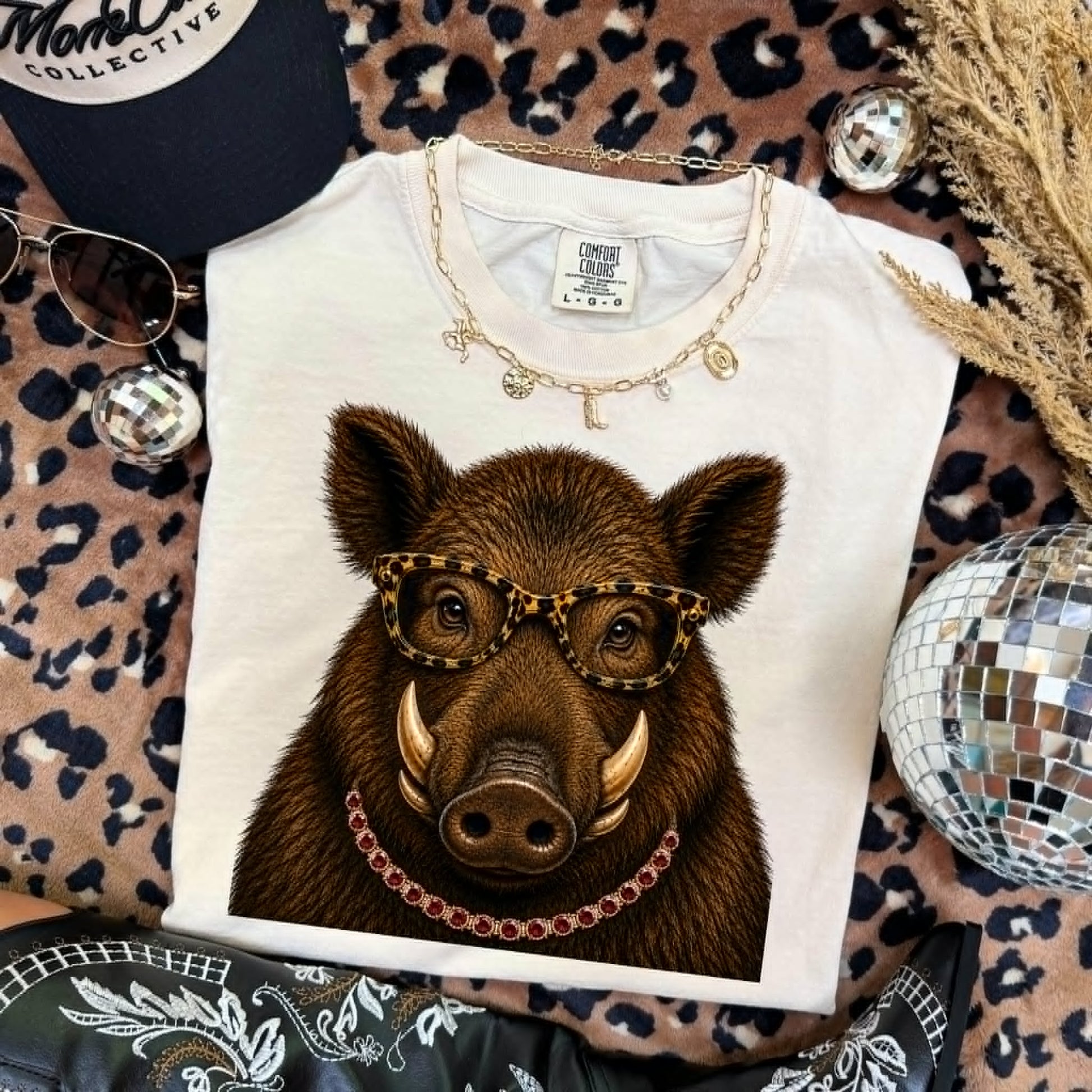 Bougie Boar mascot graphic tee flat lay