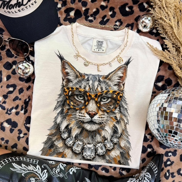 Bougie Bobcat mascot graphic tee flat lay
