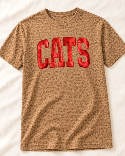 Cats in the Wild Tee in tonal brown leopard print with raised metallic red CATS lettering.
