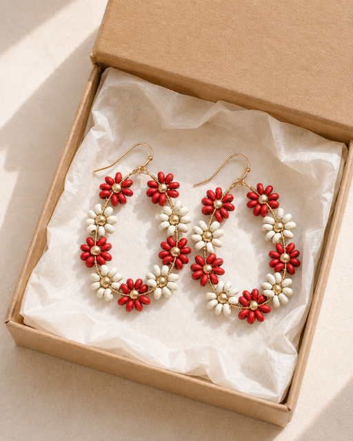 Daisy Lane floral earrings packaged in a gift box with tissue paper.