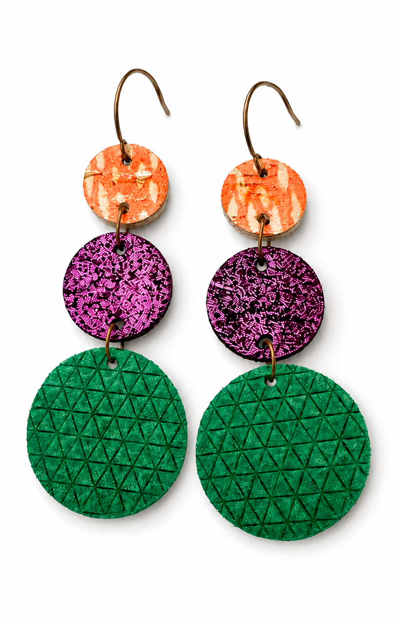 Front view of handmade Garden Party leather and cork dangle earrings featuring coral, purple, and emerald green textured circles with antique bronze hooks.