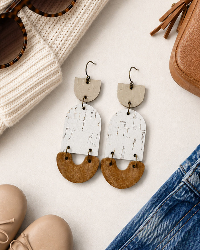 Golden Birch neutral cork and leather earrings styled with cozy neutral wardrobe pieces.
