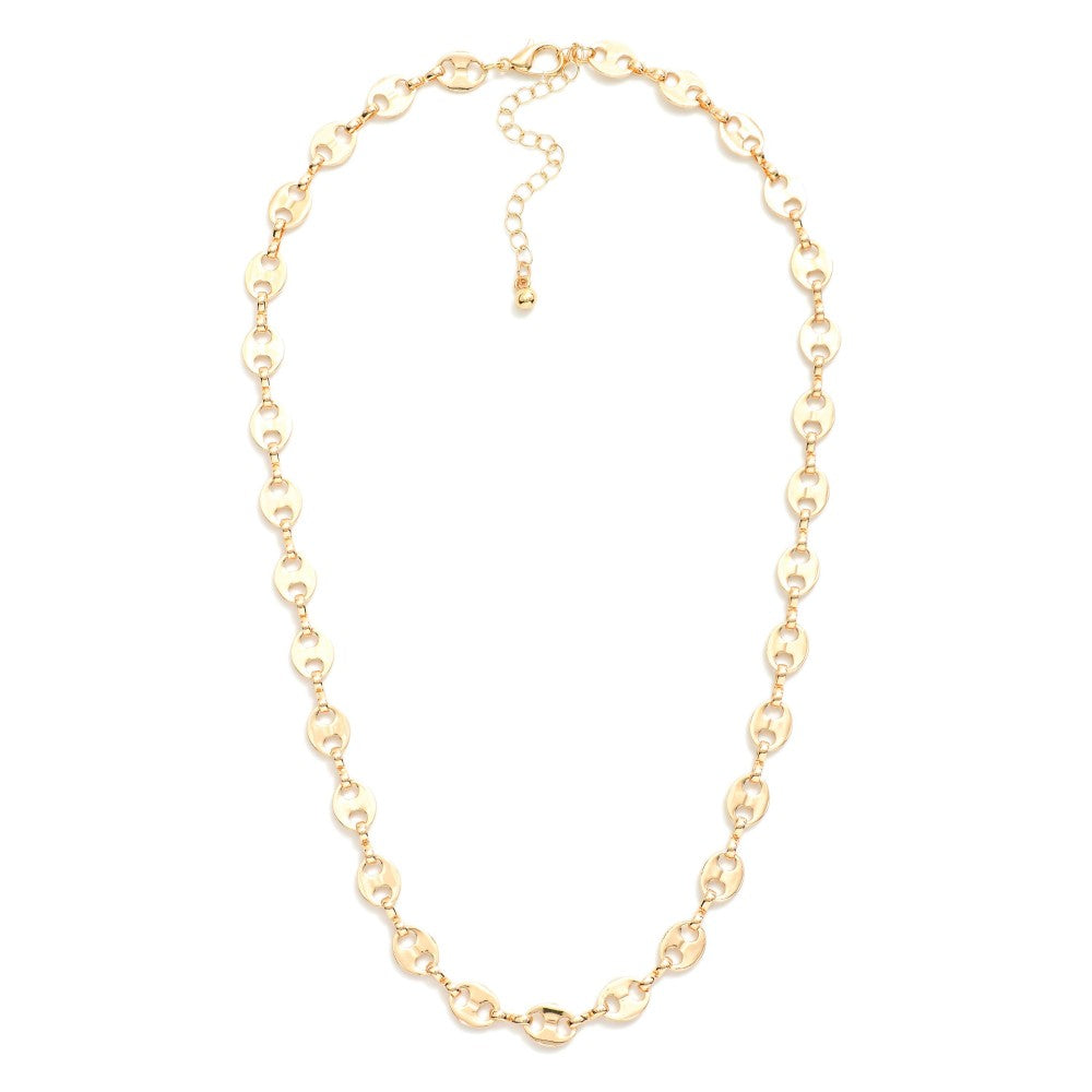 Golden Together Necklace featuring polished gold-tone oval pig nose chain links, adjustable 16-inch length with 3-inch extender, on a white background.