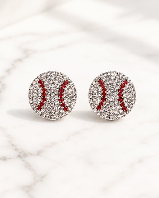 Home Run Luxe rhinestone baseball stud earrings with silver-tone hardware on white marble