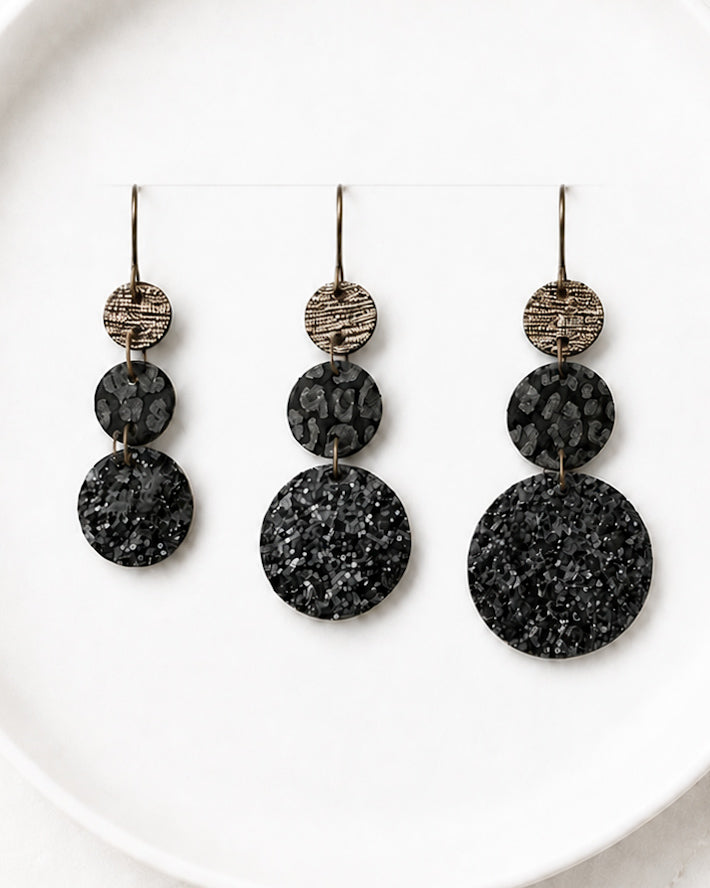 Small, medium, and large Inner Circle Earrings shown together for size comparison