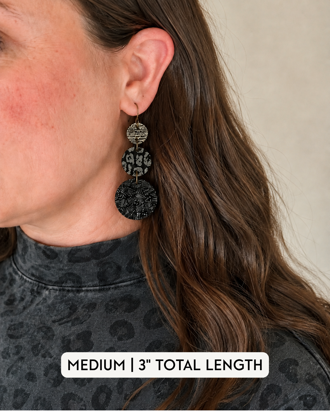 Medium Inner Circle Earrings modeled to show the 3-inch length and scale