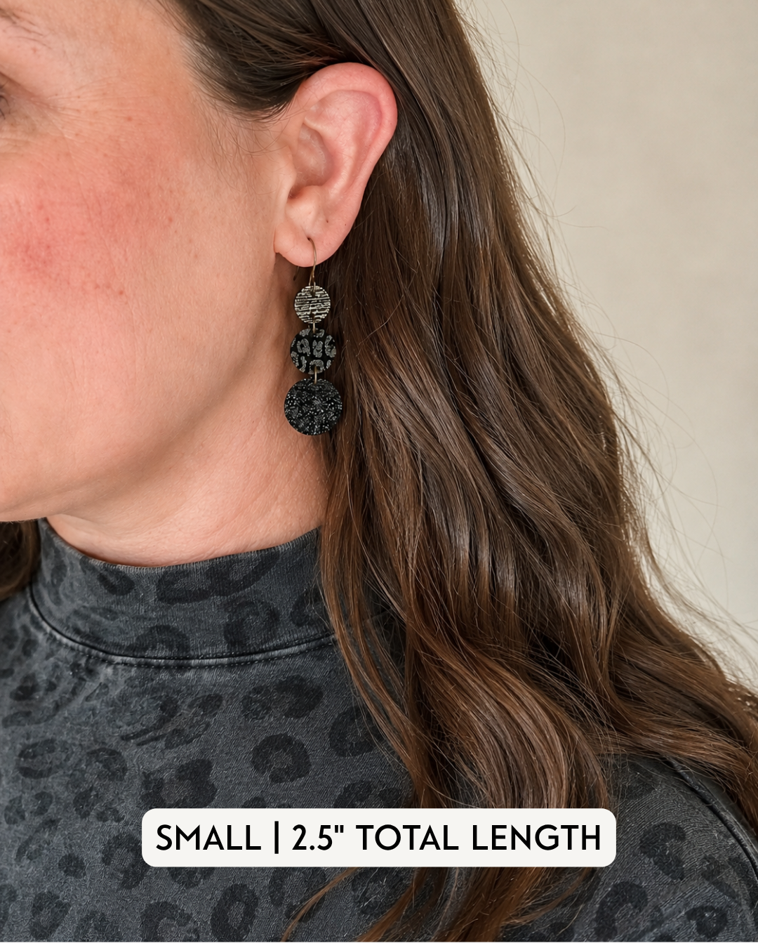 Small Inner Circle Earrings modeled to show the 2.5-inch length and scale