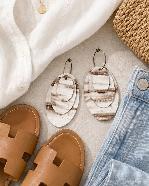 Linen Tide Earrings styled with a white shirt, light-wash jeans and tan sandals for an easy neutral outfit.