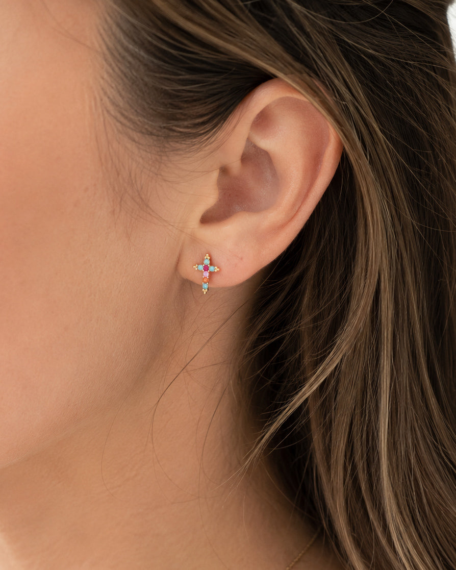 Morning Joy colorful cross stud earrings worn on ear showing size and fit