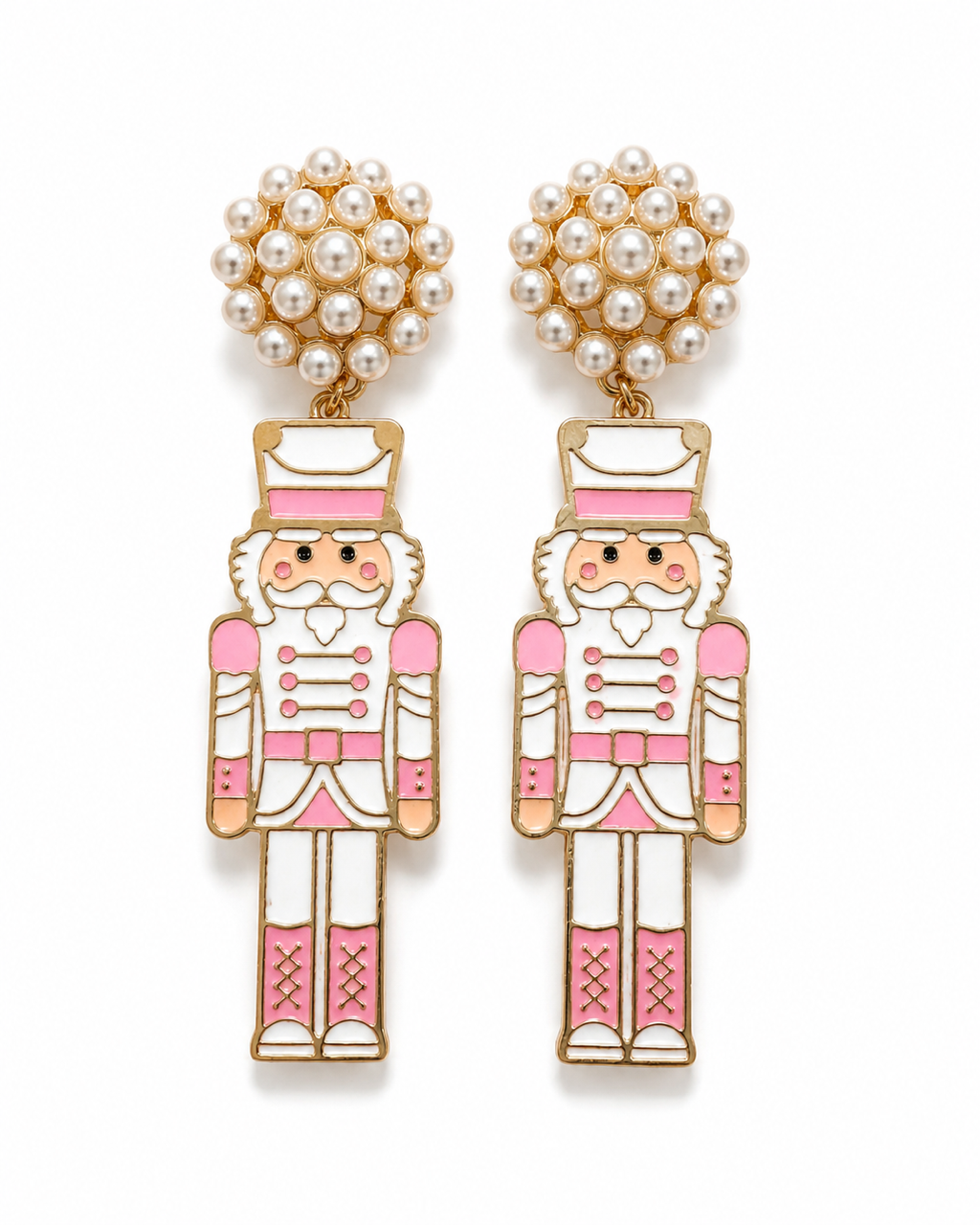 Blush pink nutcracker earrings with pearl cluster studs and gold-tone details on a white background.