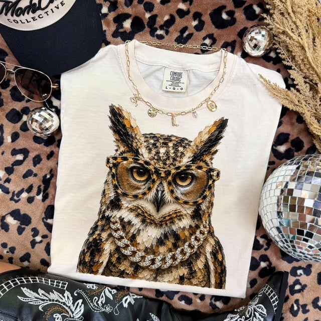 Bougie Owl mascot graphic tee flat lay