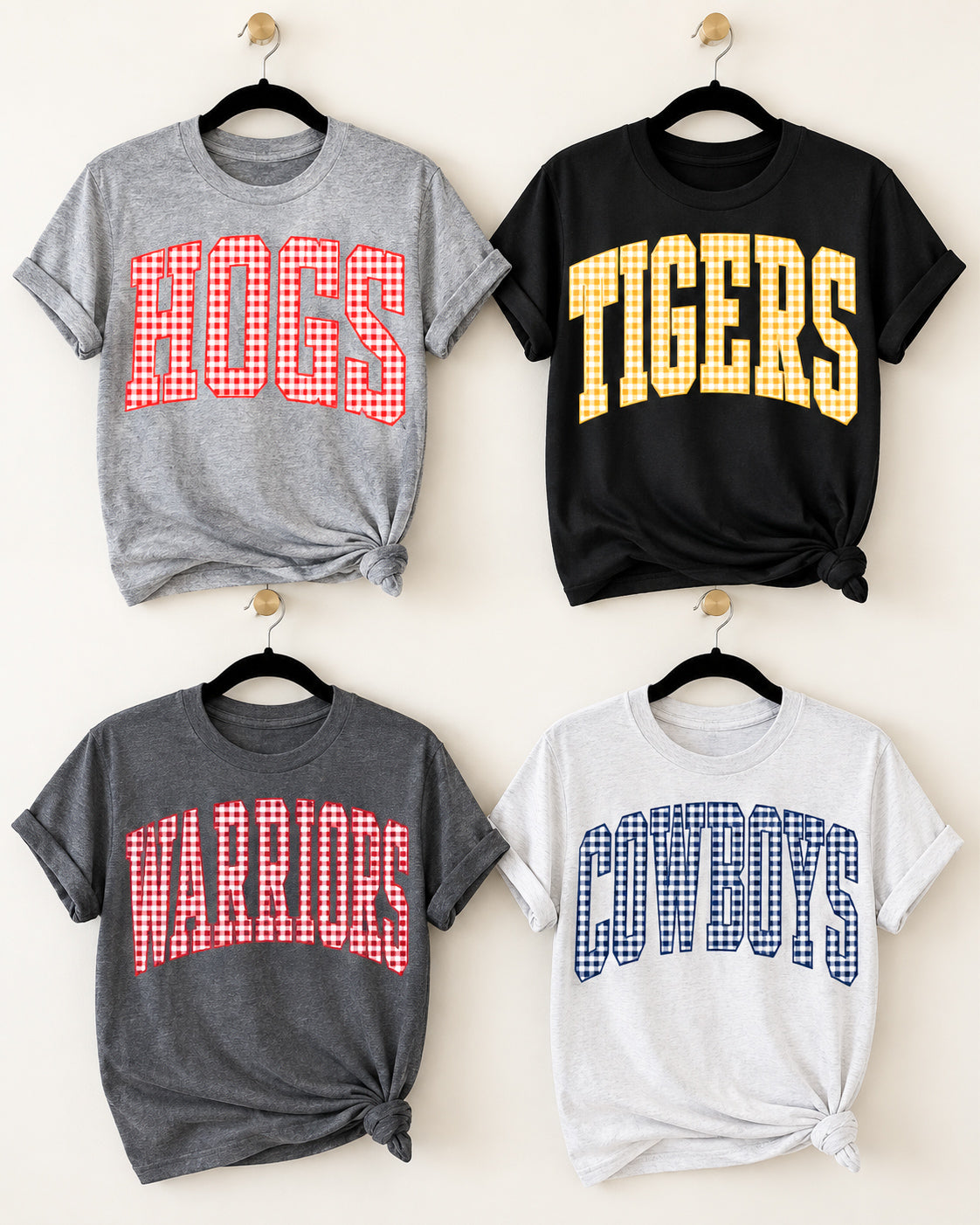 Four customizable gingham graphic tees on hangers featuring HOGS, TIGERS, WARRIORS, and COWBOYS in different shirt and gingham color combinations.