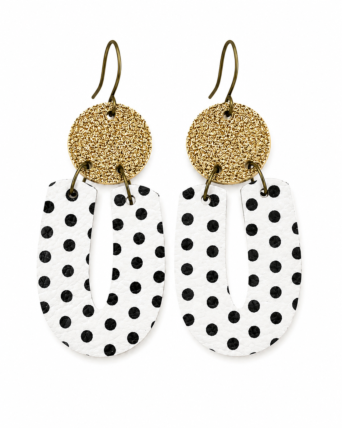Black and white polka dot earrings with matte gold glitter tops shown against a clean white background.