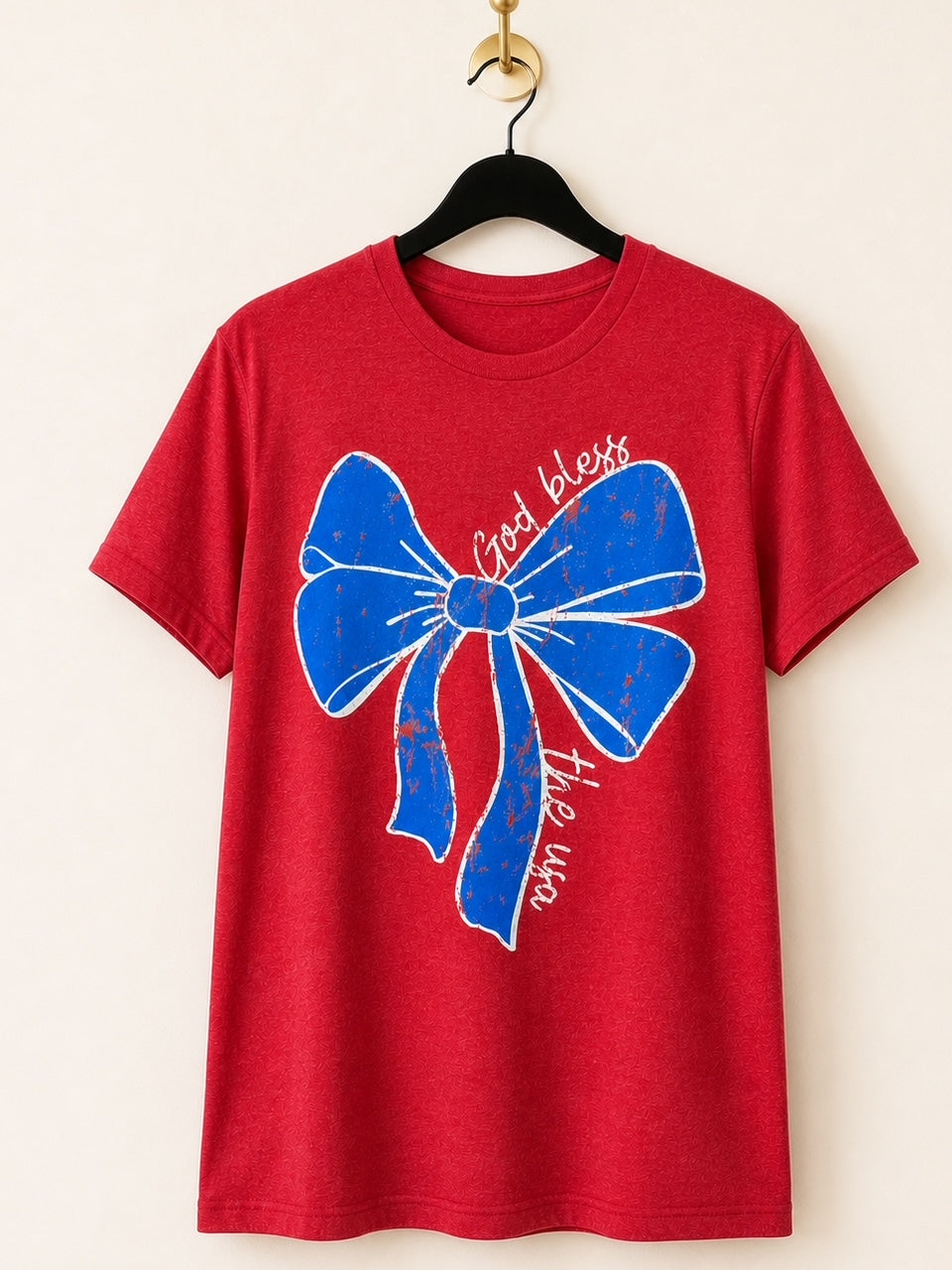 Small Town USA graphic tee in heather red featuring a distressed patriotic bow and God Bless the USA design.