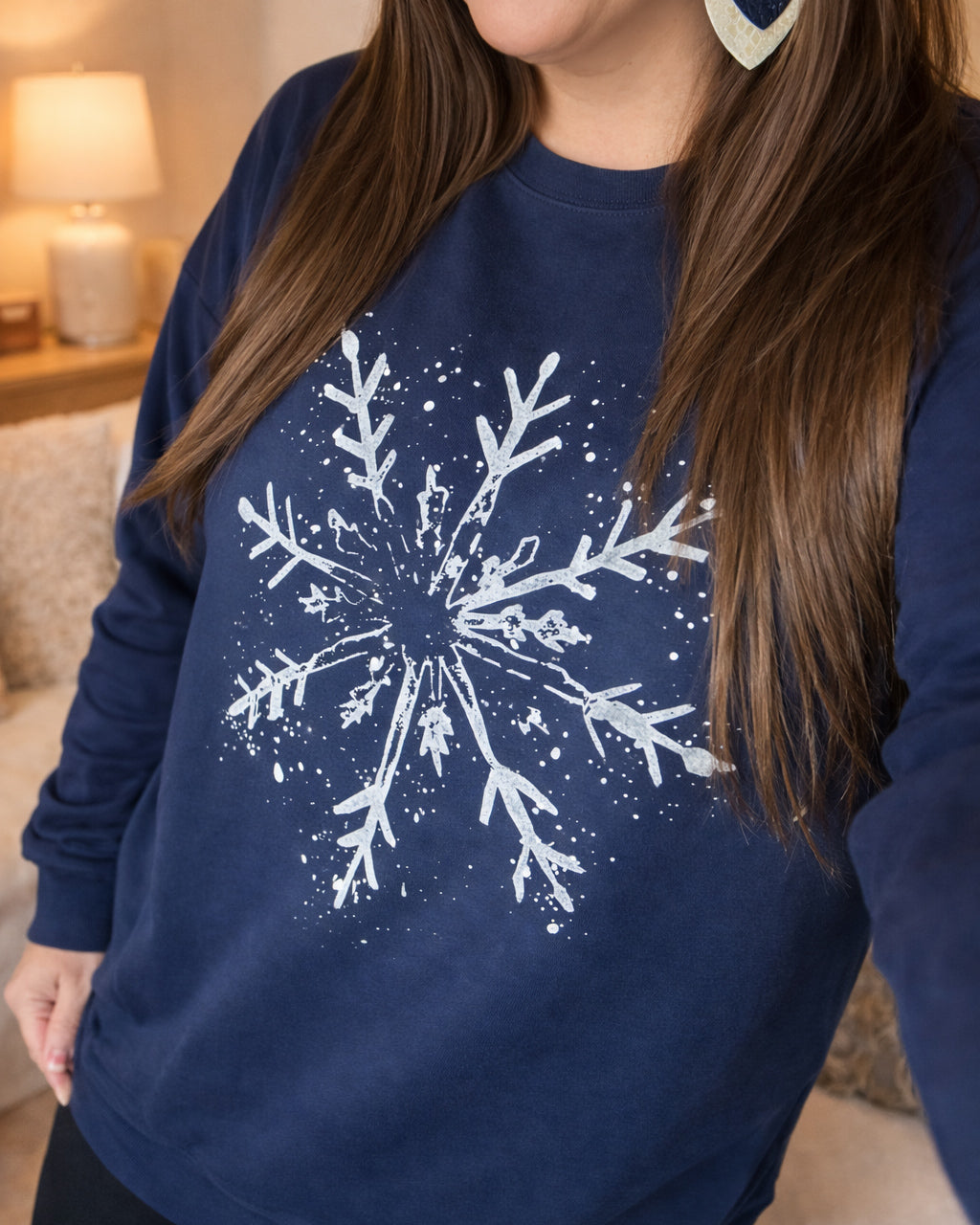 Navy Snowfall Ink sweatshirt with white snowflake graphic shown worn, cozy winter graphic sweatshirt preorder
