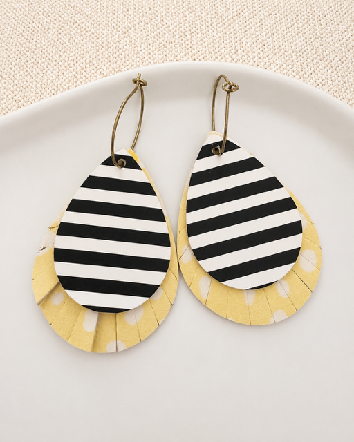 Legacy Stripe Earrings with stacked striped and yellow polka-dot layers in a white dish