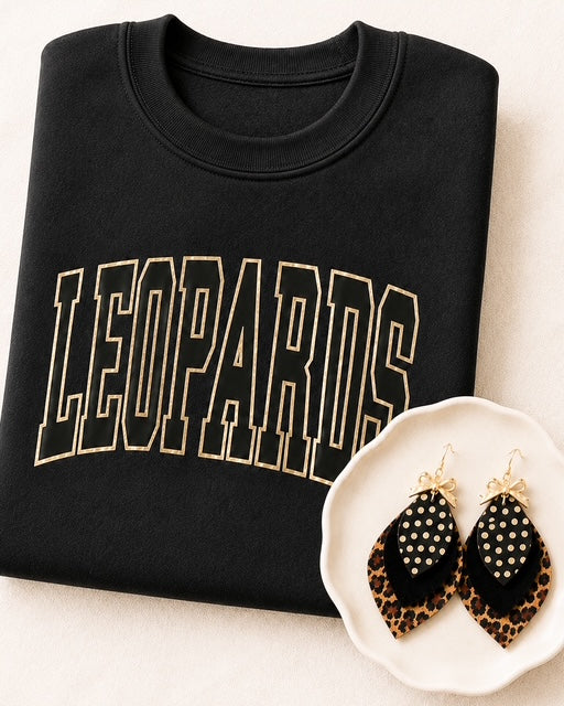 Leopard Glam Earrings paired with black and gold Varsity Edit LEOPARDS spirit wear shirt
