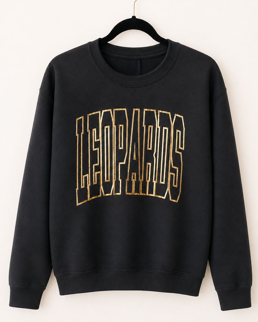 Black Varsity Edit Leopards crewneck sweatshirt with metallic-gold lettering on a hanger