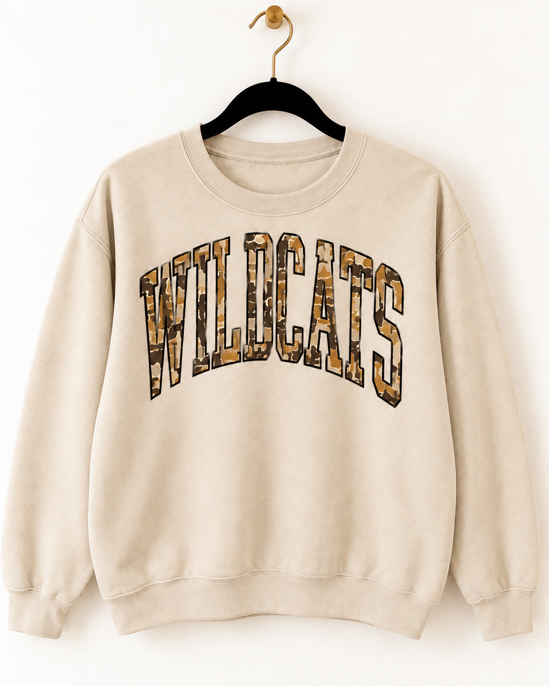 Sand crewneck Wildcat Territory sweatshirt with arched camouflage WILDCATS lettering on a black hanger.