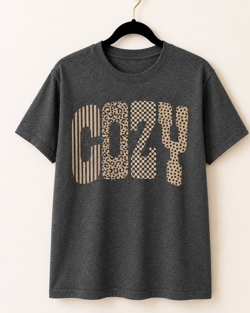 Dark heather gray Bella+Canvas Wildly Cozy short-sleeve tee with mixed-pattern COZY lettering.