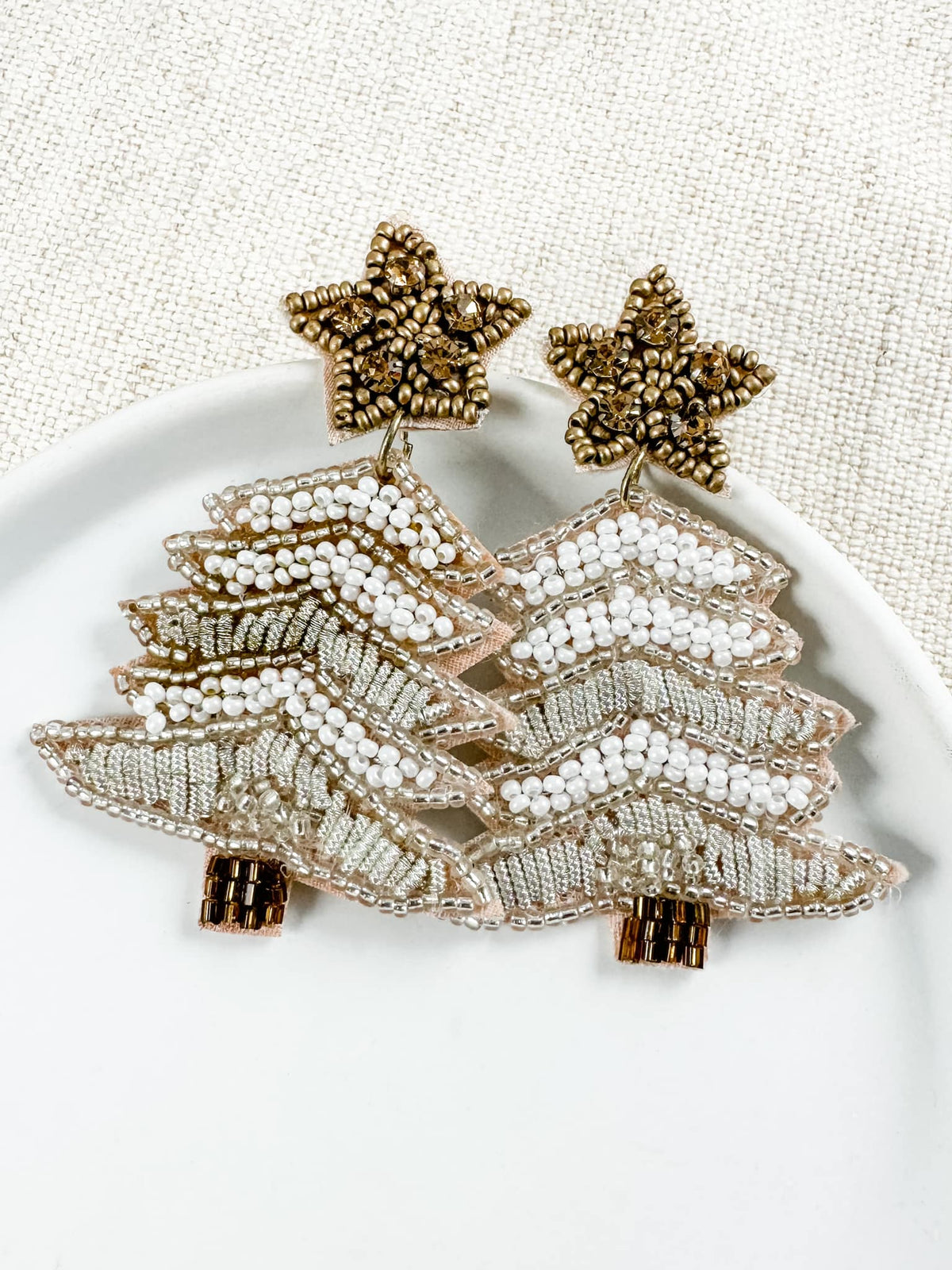 Ivory seed bead Christmas tree statement earrings with post back closure and elongated drop design.